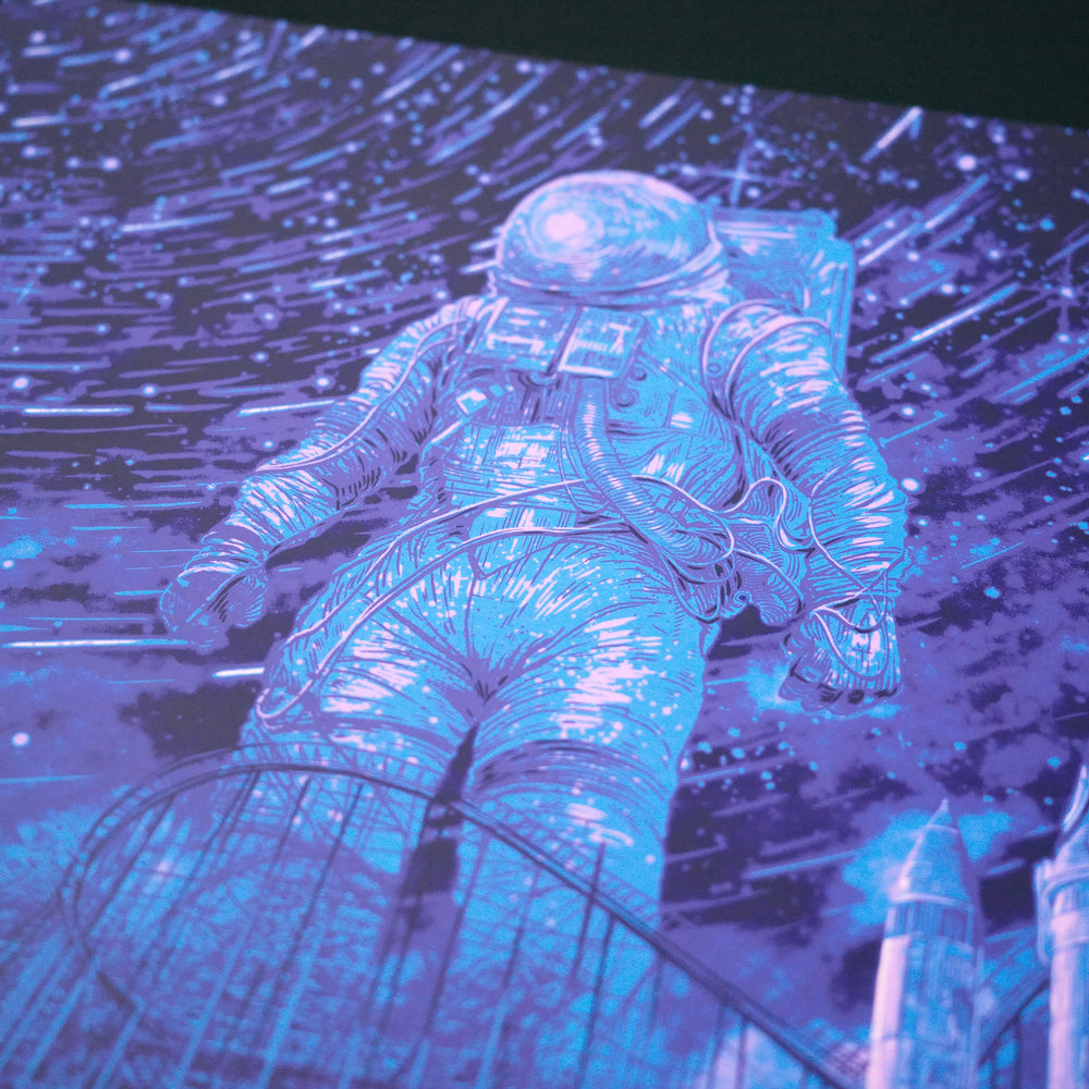 close up of daniel danger poster with astronaut in background