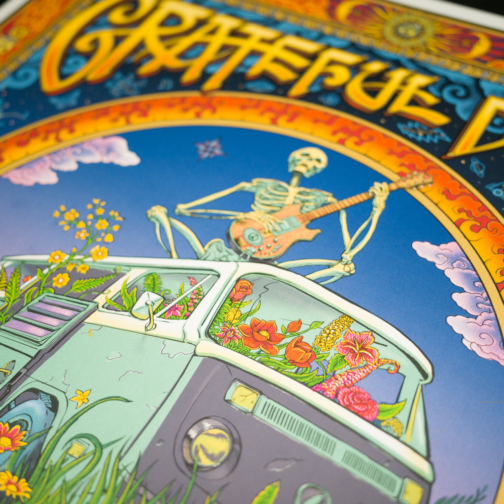 close up of grateful dead poster with skeleton with guitar