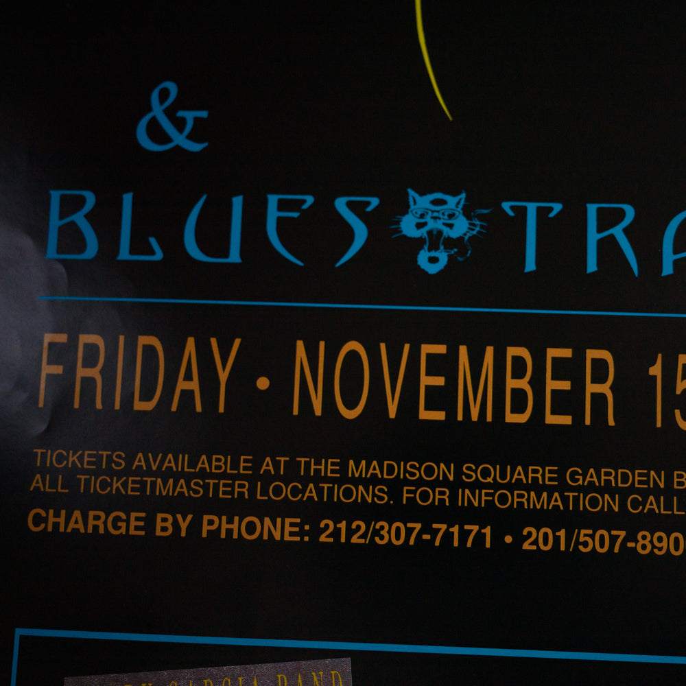 close up of jerry garcia concert poster with date