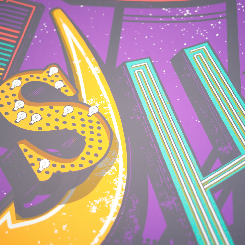 close up of justin helton phish concert poster