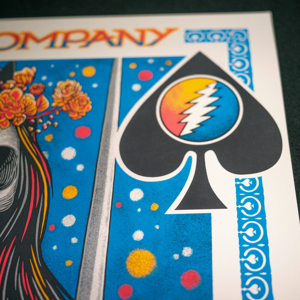 close up of john vogl dead and company poster with lightning bolt inside spade