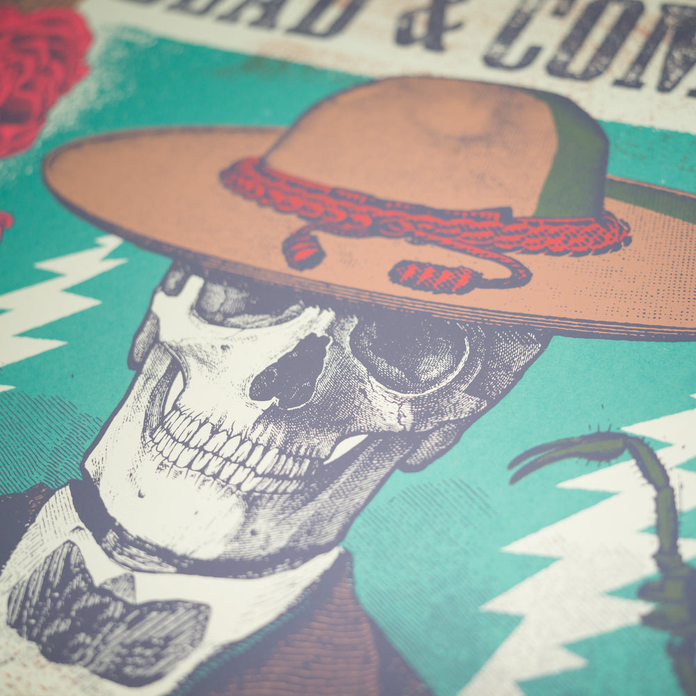 close up of justin helton dead and company concert poster with skeletons