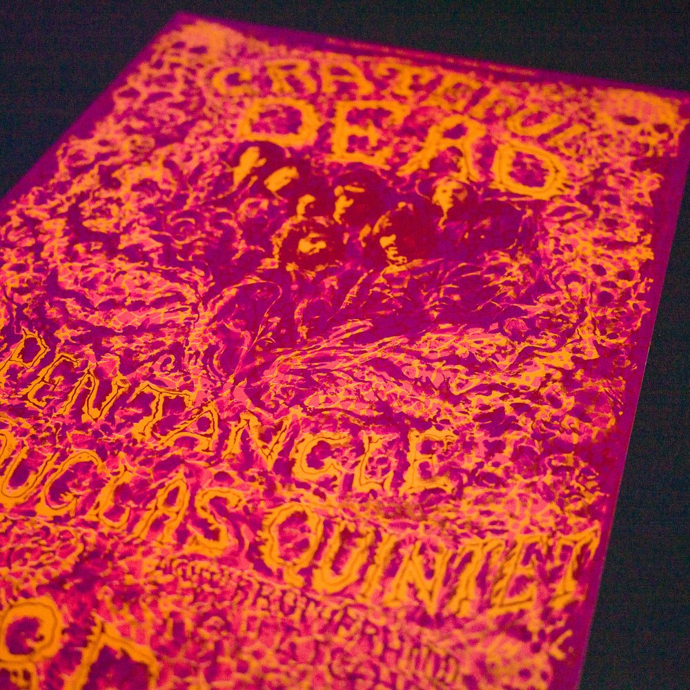 close up of lee conklin grateful dead concert poster with red background  