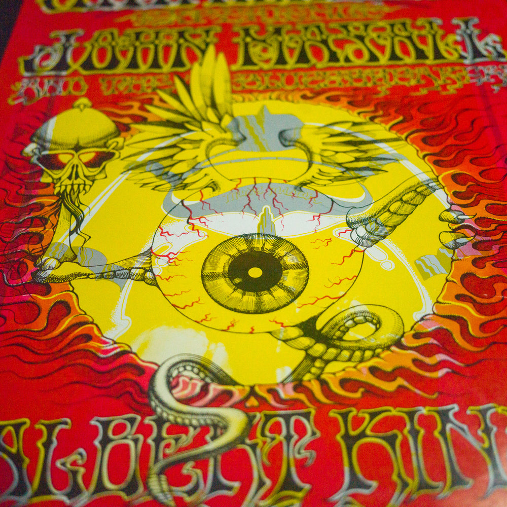 close up of RickGriffinJimiHendrix1968SanFranciscoConcertPoster with yellow eyeball and red brackground